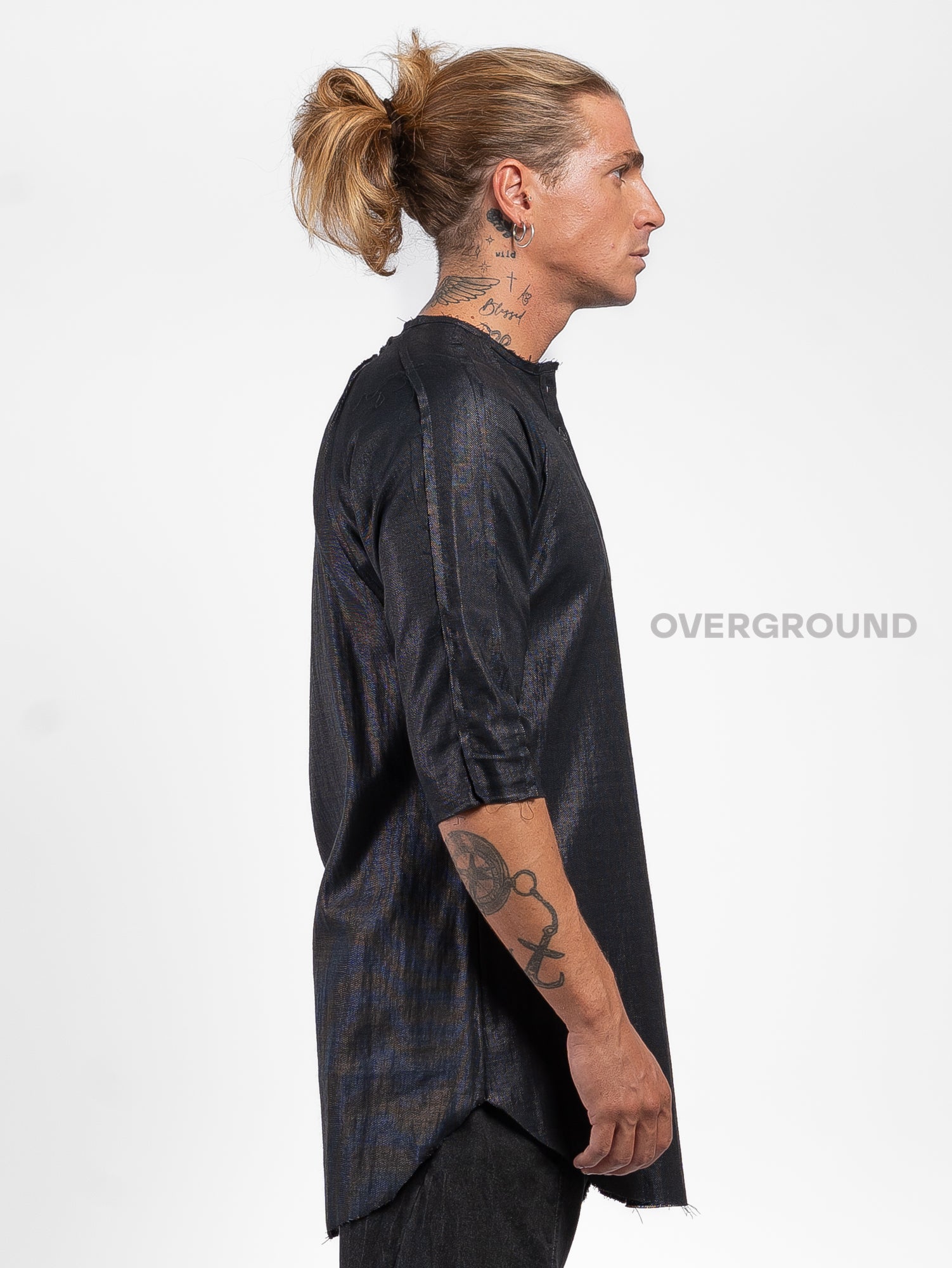 Maglia asimmetrica con bottoni