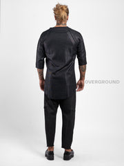 Maglia asimmetrica con bottoni