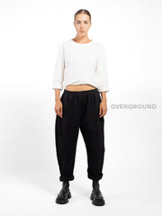 PANTALONE OVER CON CUCITURE E TASCHE SUL GAMBULE