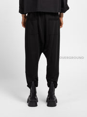 PANTALONE A CAVALLO BASSO CUCITURE E TASCHE FRONTALI