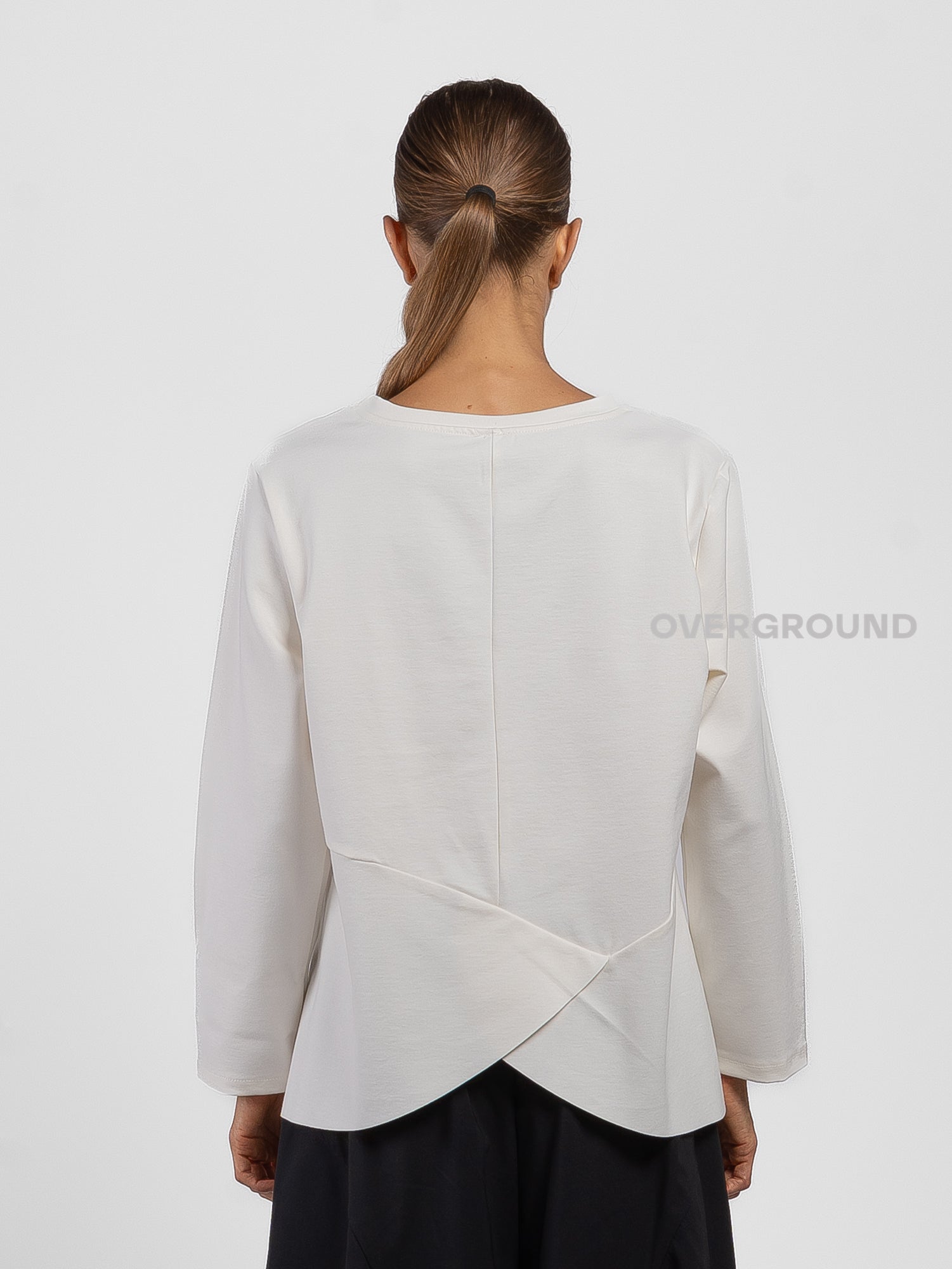 BLUSA CON CUCITURE STONDATA IN FONDO