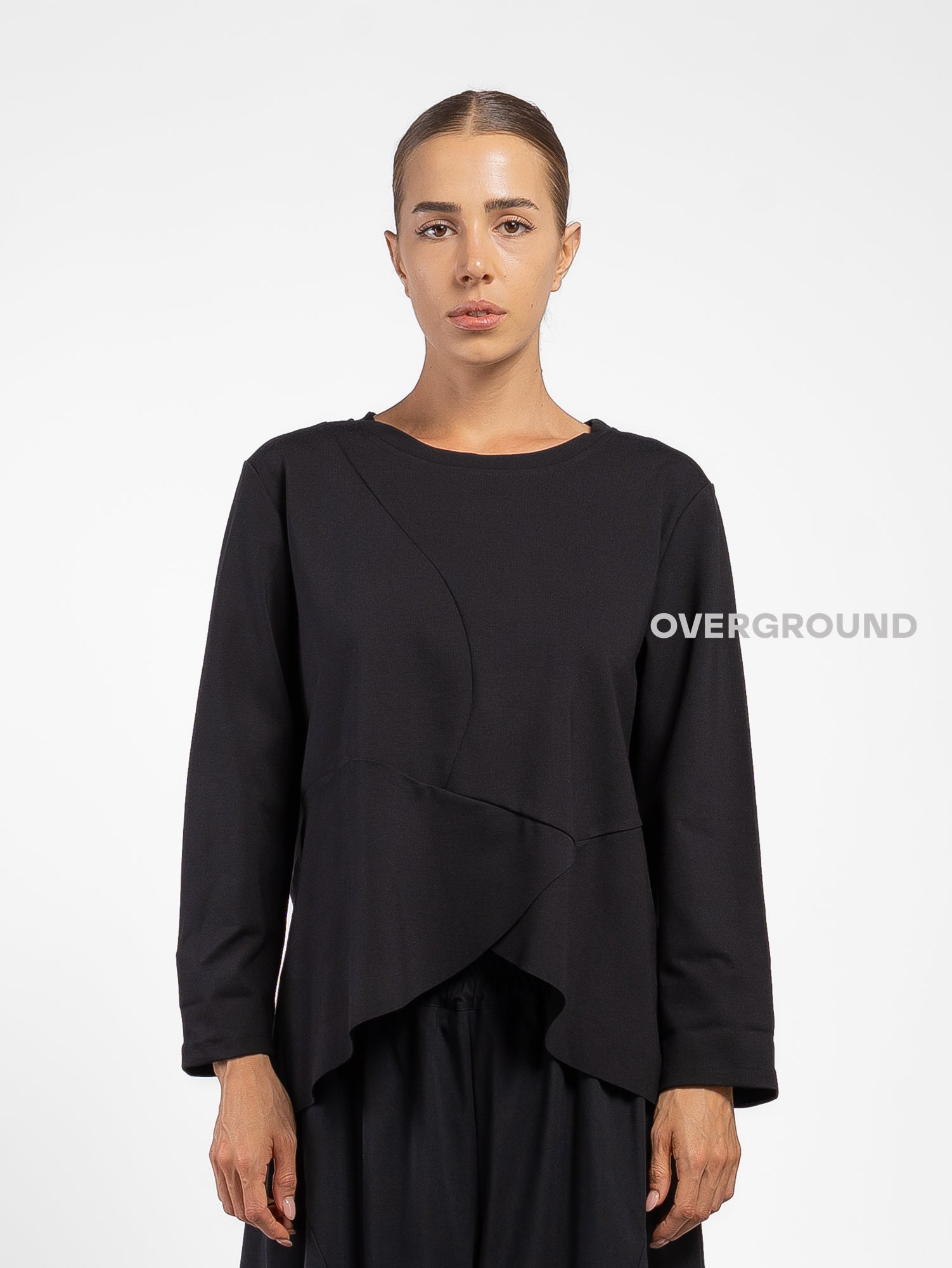 BLUSA CON CUCITURE STONDATA IN FONDO