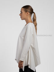 BLUSA OVER ASIMMETRICA CON CUCITURE