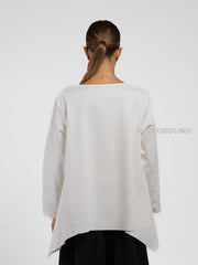 BLUSA OVER ASIMMETRICA CON CUCITURE