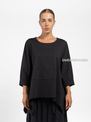 BLUSA OVER ASIMMETRICA CON CUCITURE