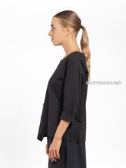BLUSA CON CUCITURE E TASCA LATERALE