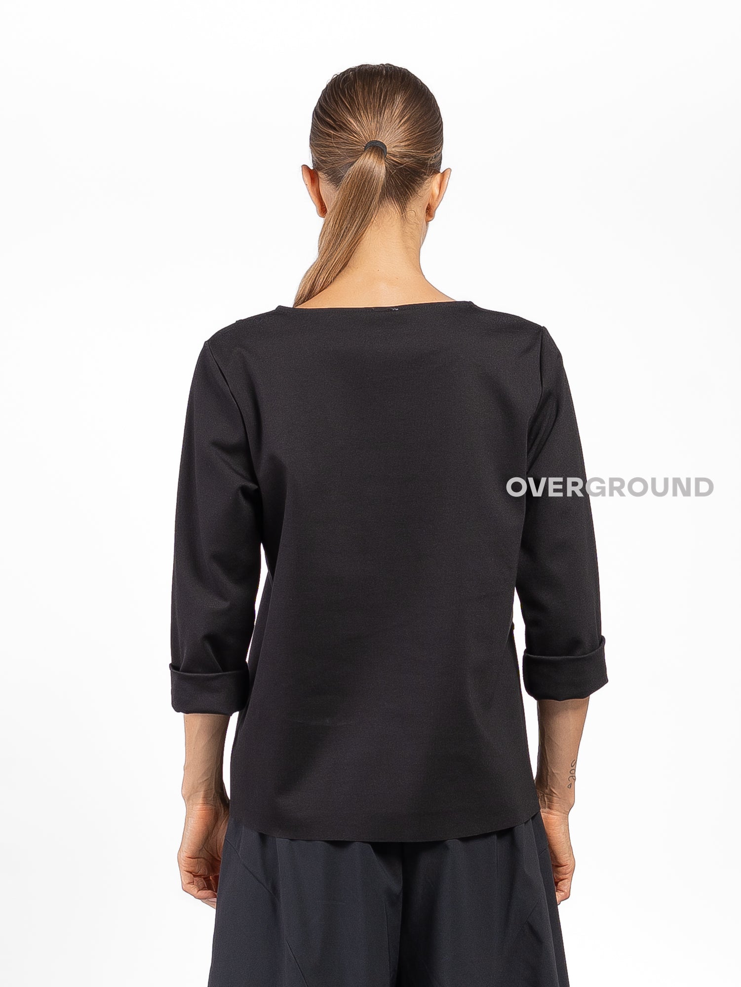 BLUSA CON CUCITURE E TASCA LATERALE