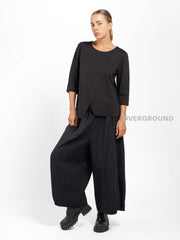 BLUSA CON CUCITURE E TASCA LATERALE