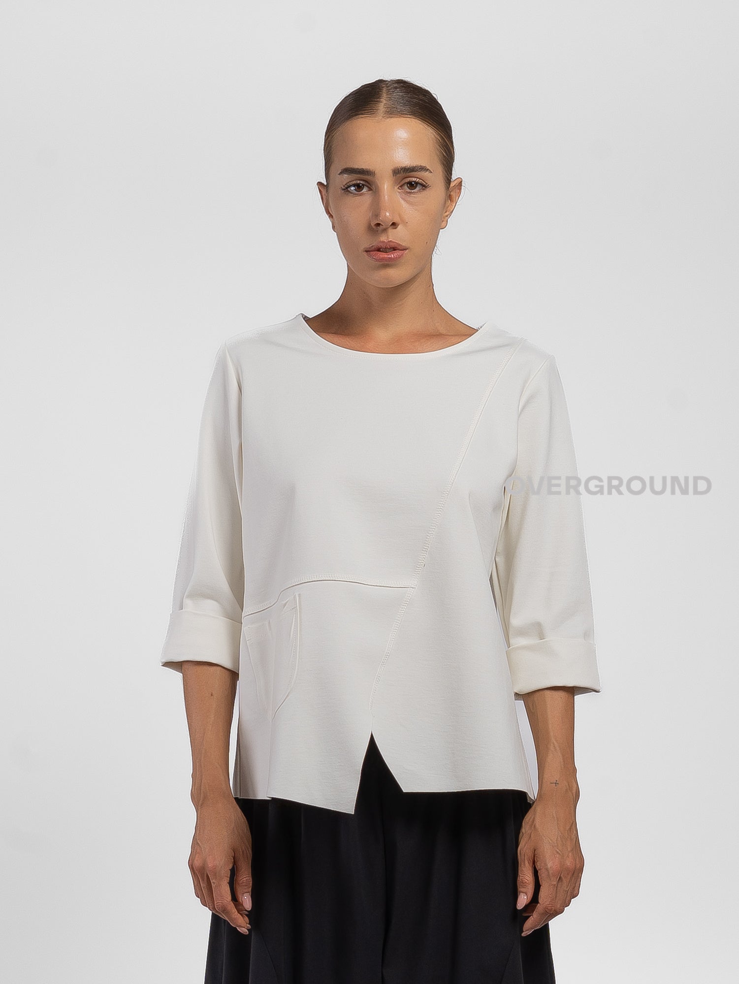 BLUSA CON CUCITURE E TASCA LATERALE
