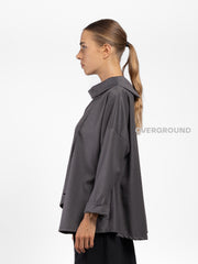BLUSA OVER ASIMMETRICA CON COLLO A BARCA