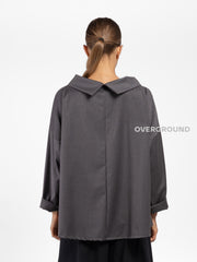BLUSA OVER ASIMMETRICA CON COLLO A BARCA