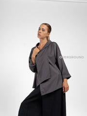 BLUSA OVER ASIMMETRICA CON COLLO A BARCA