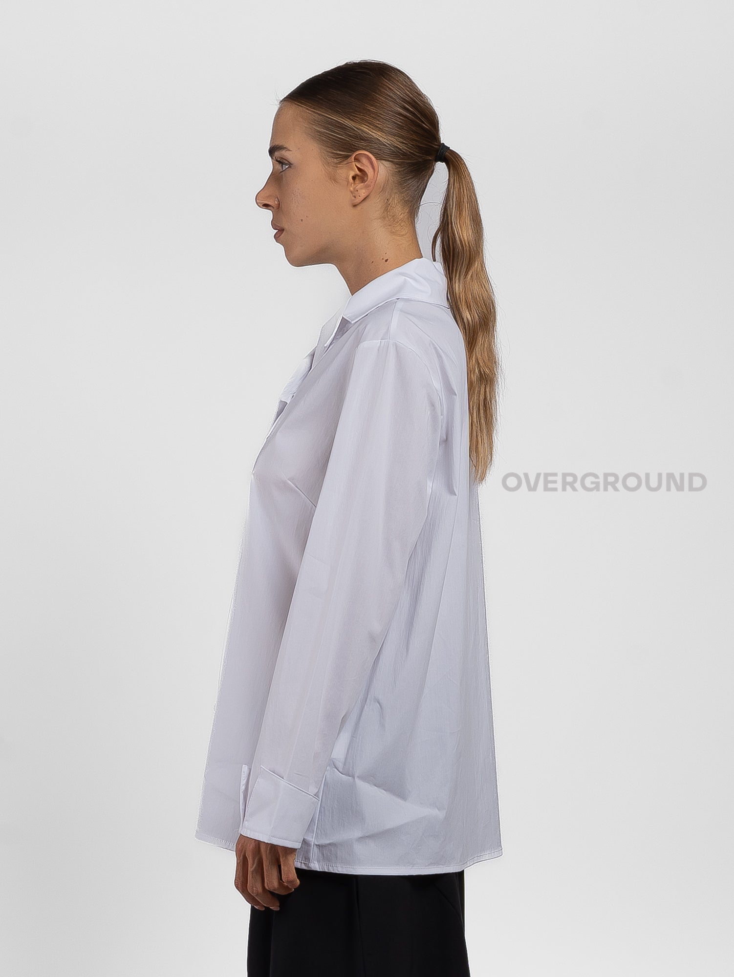 Camicia asimmetrica con spacco davanti