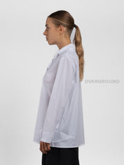 Camicia asimmetrica con spacco davanti