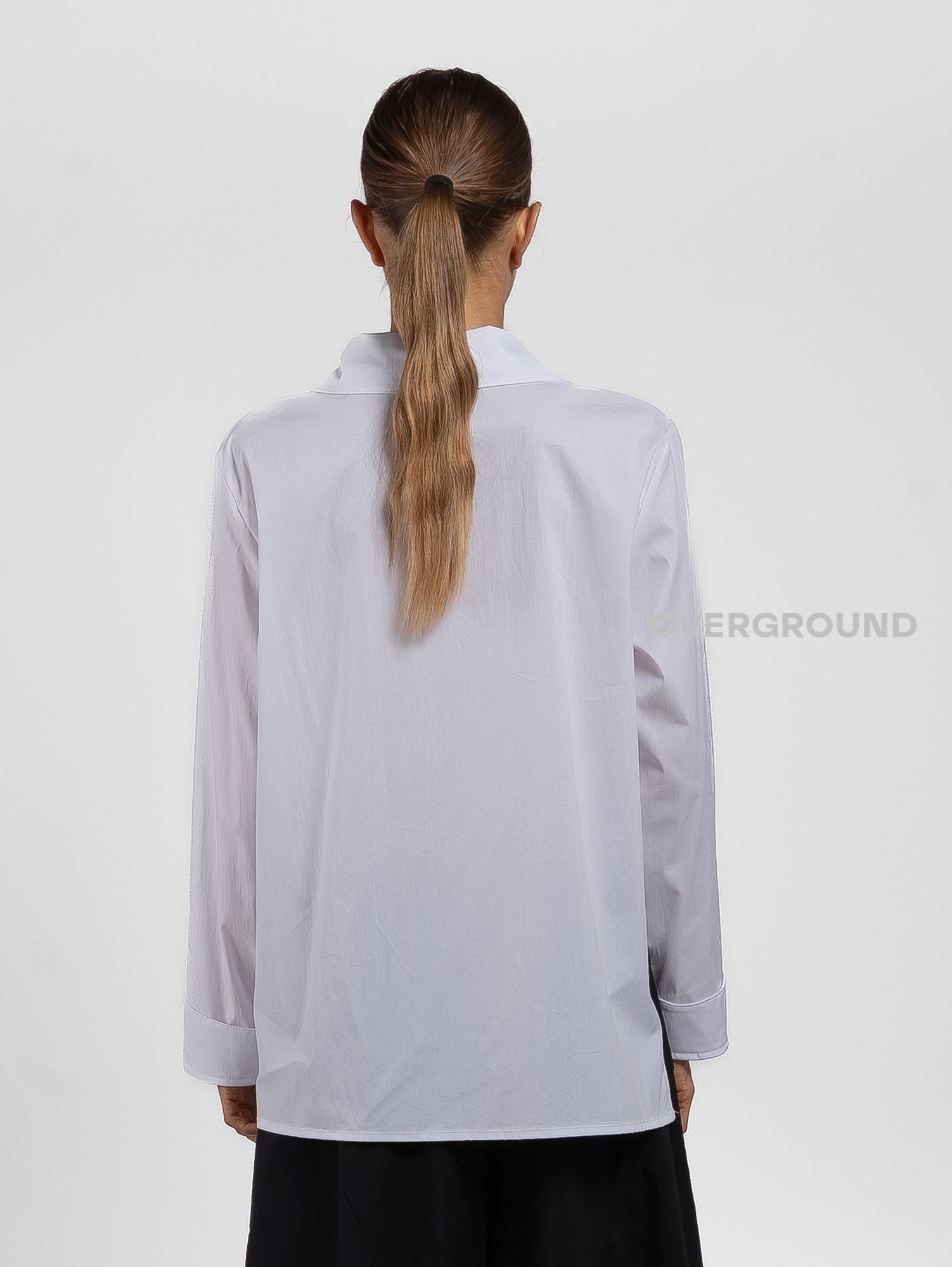 Camicia asimmetrica con spacco davanti
