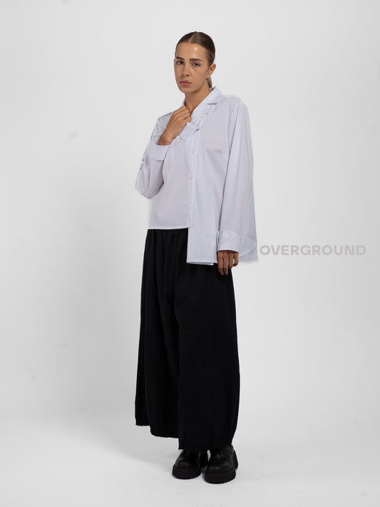 Camicia asimmetrica con spacco davanti
