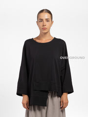 MAGLIA LARGA ASIMMETRICA