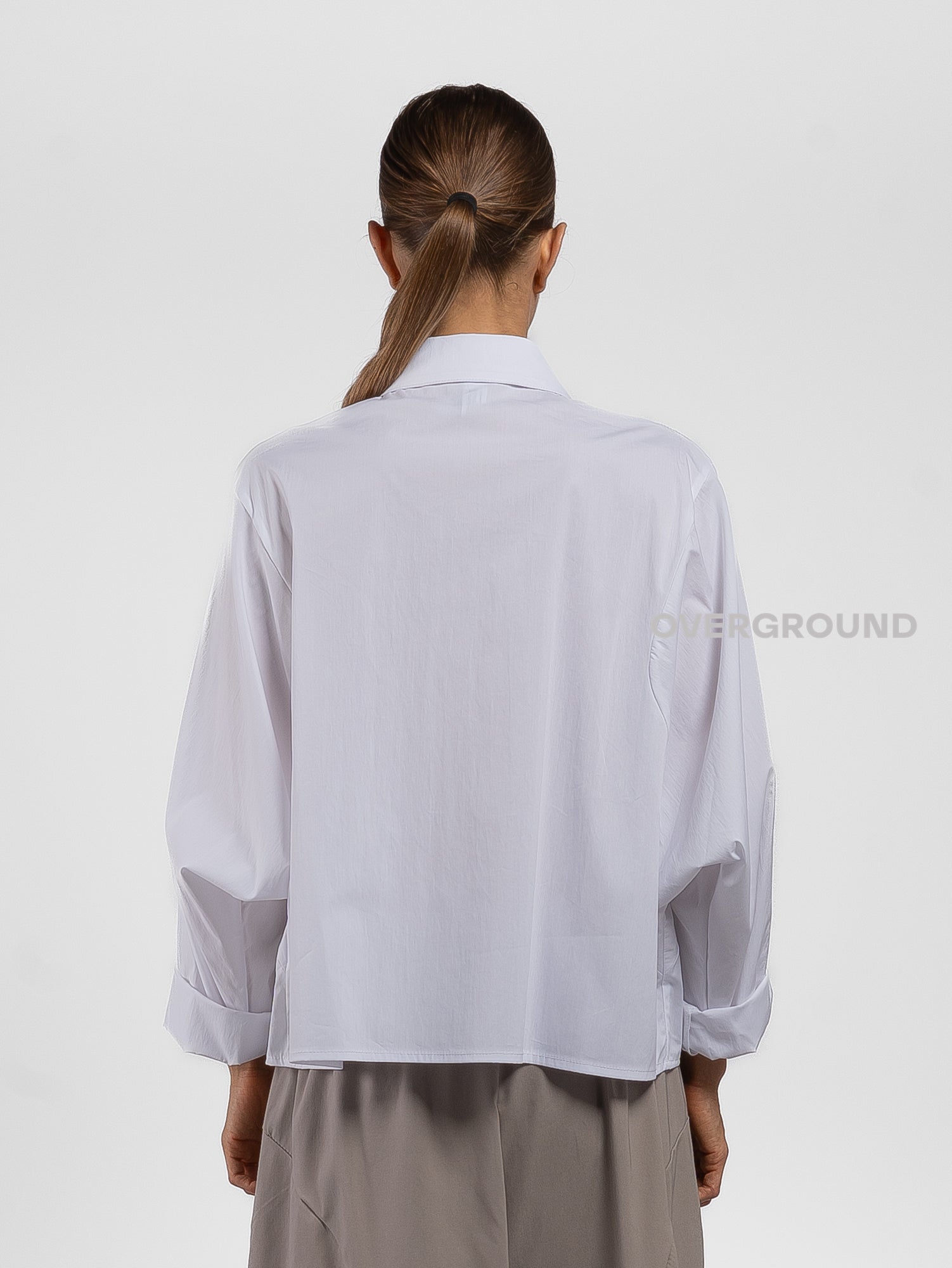 CAMICIA CON TASCONI FRONTALI