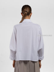 CAMICIA CON TASCONI FRONTALI