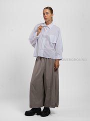 CAMICIA CON TASCONI FRONTALI