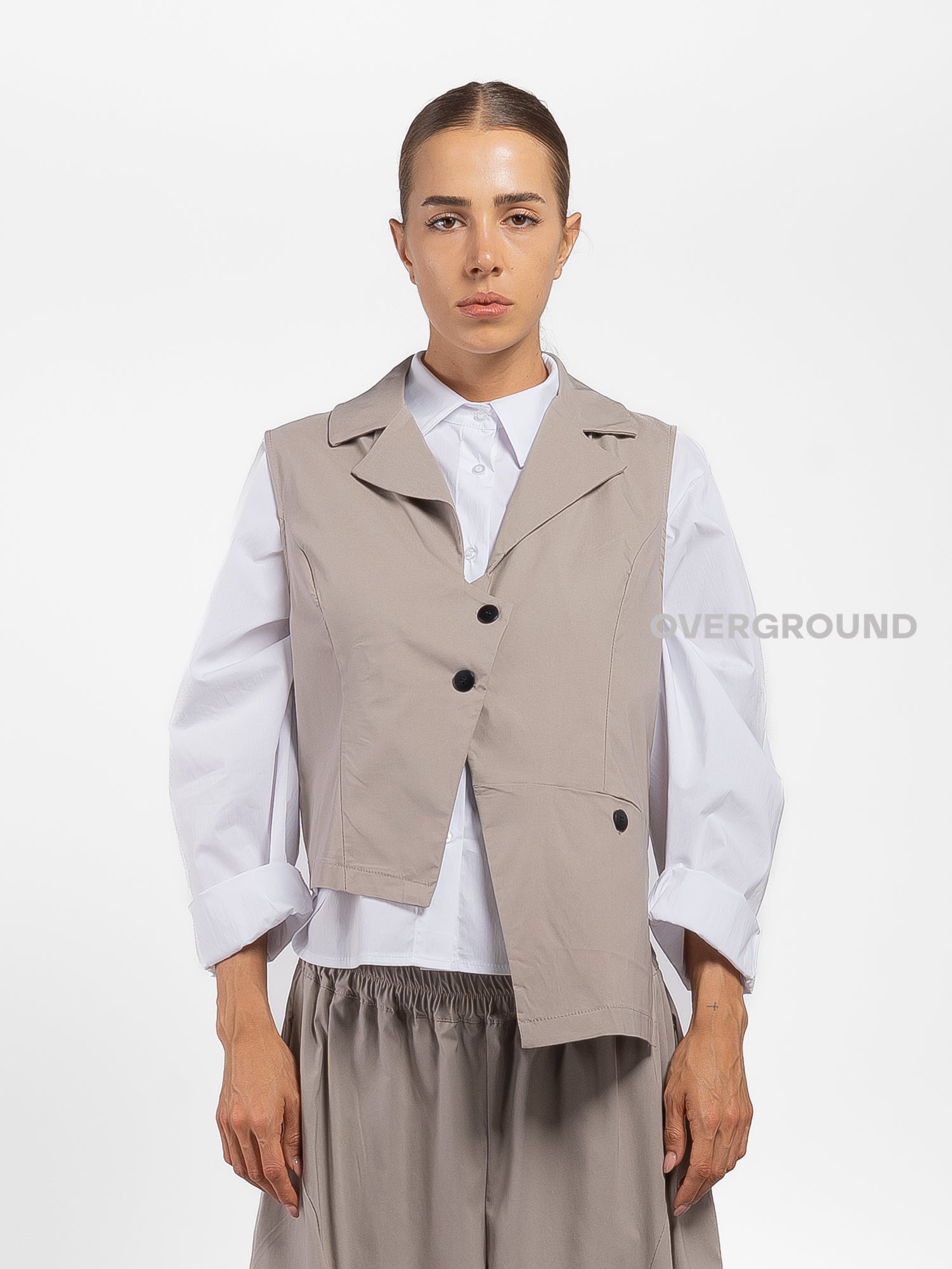 GILET ASIMMETRICO CON TASCA DAVANTI