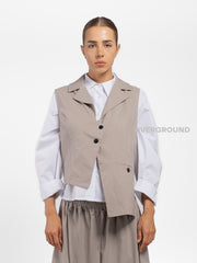 GILET ASIMMETRICO CON TASCA DAVANTI