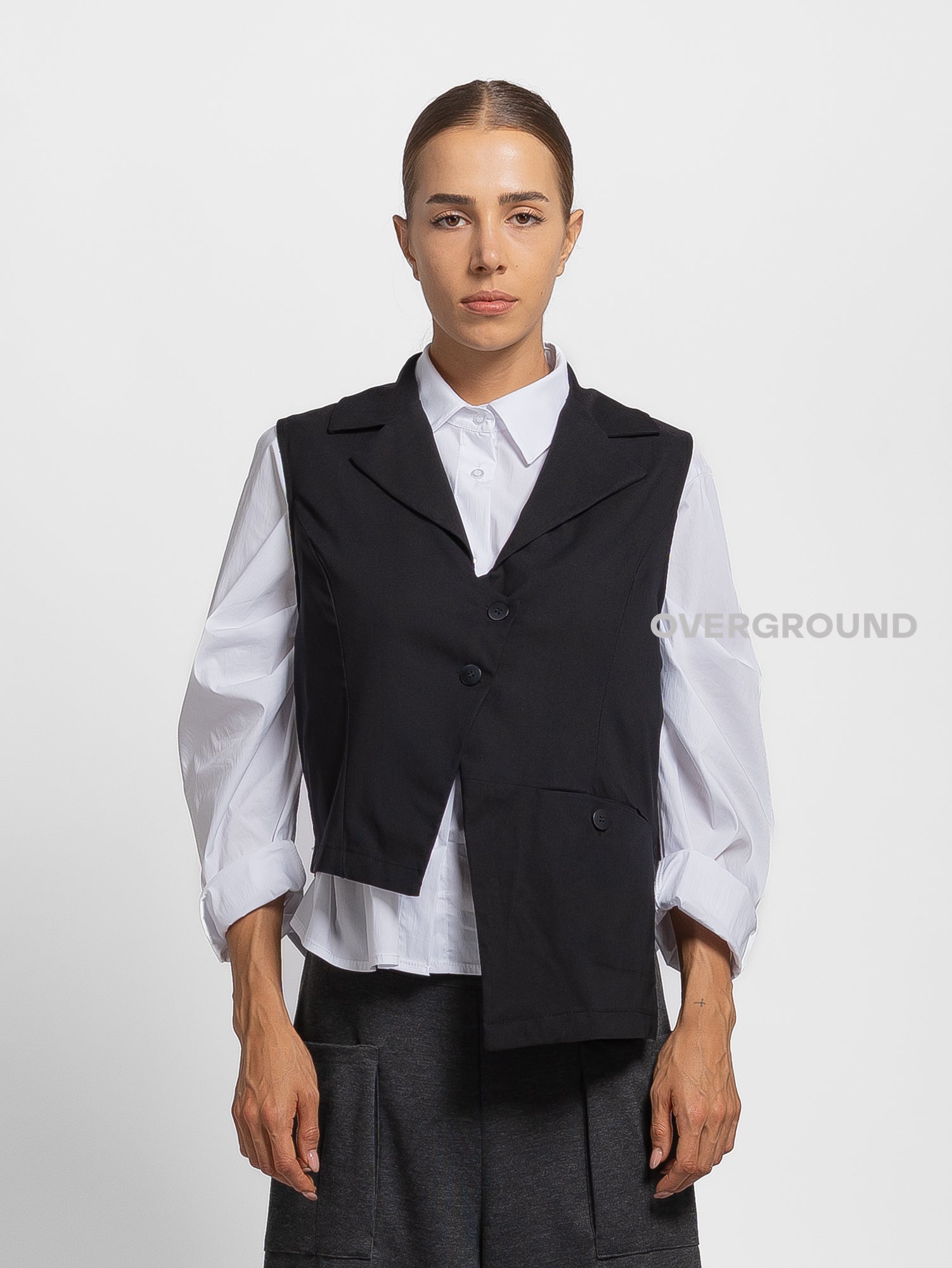 GILET ASIMMETRICO CON TASCA DAVANTI