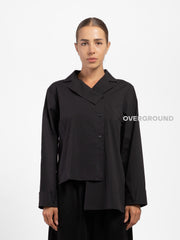 Camicia asimmetrica con spacco davanti
