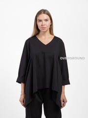 BLUSA OVER ASIMMETRICA SCOLLO A V