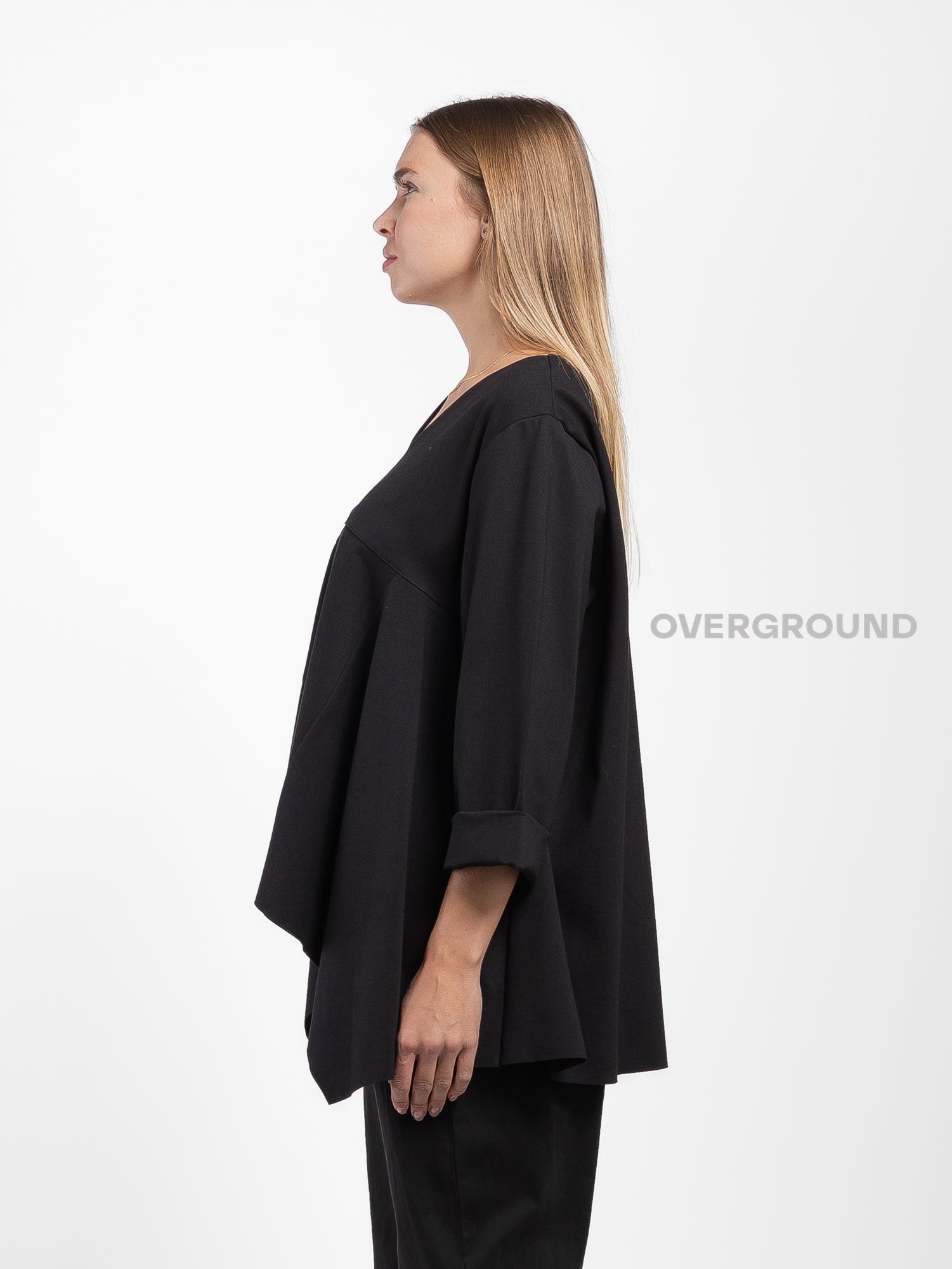 BLUSA OVER ASIMMETRICA SCOLLO A V