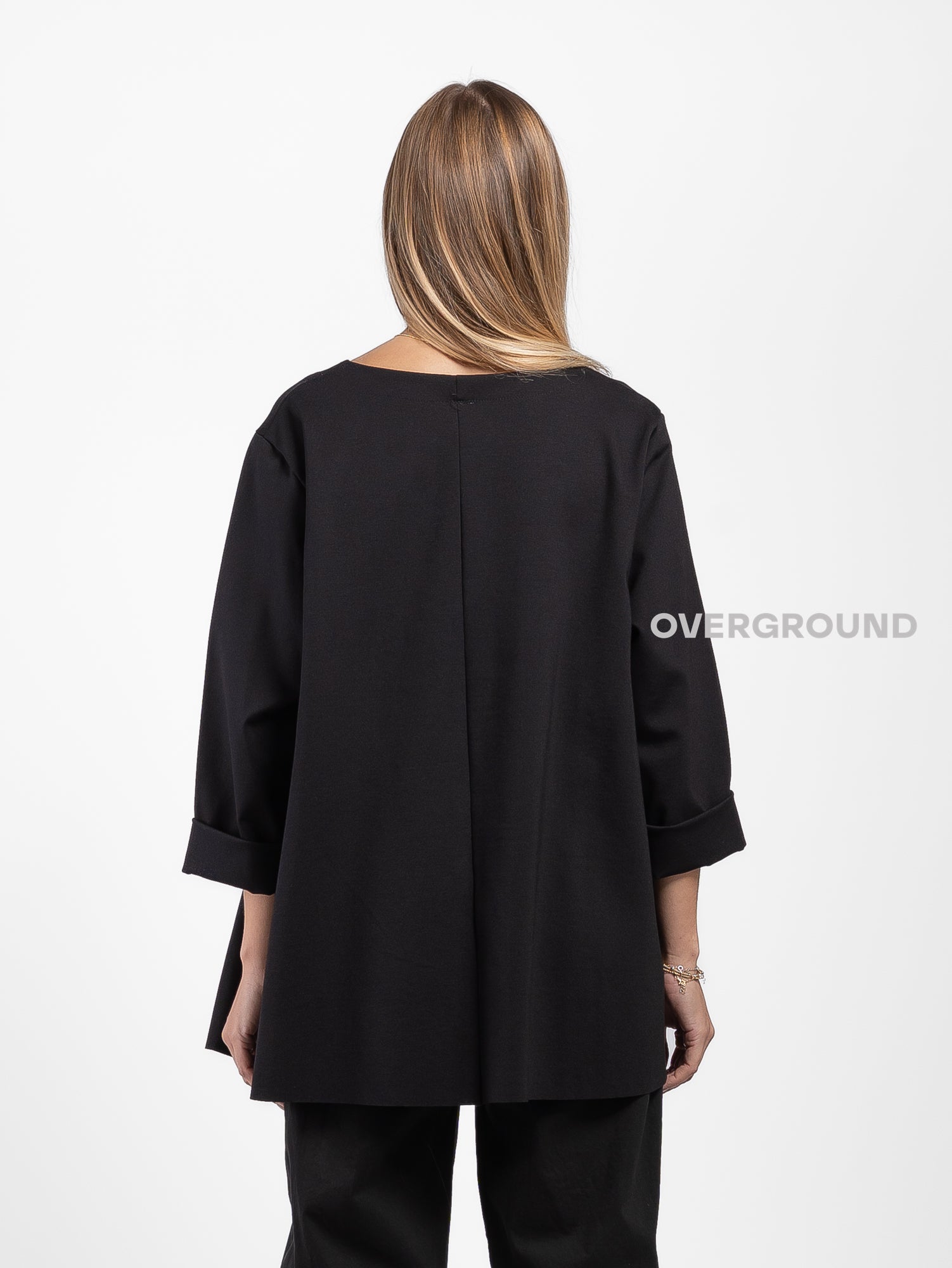 BLUSA OVER ASIMMETRICA SCOLLO A V