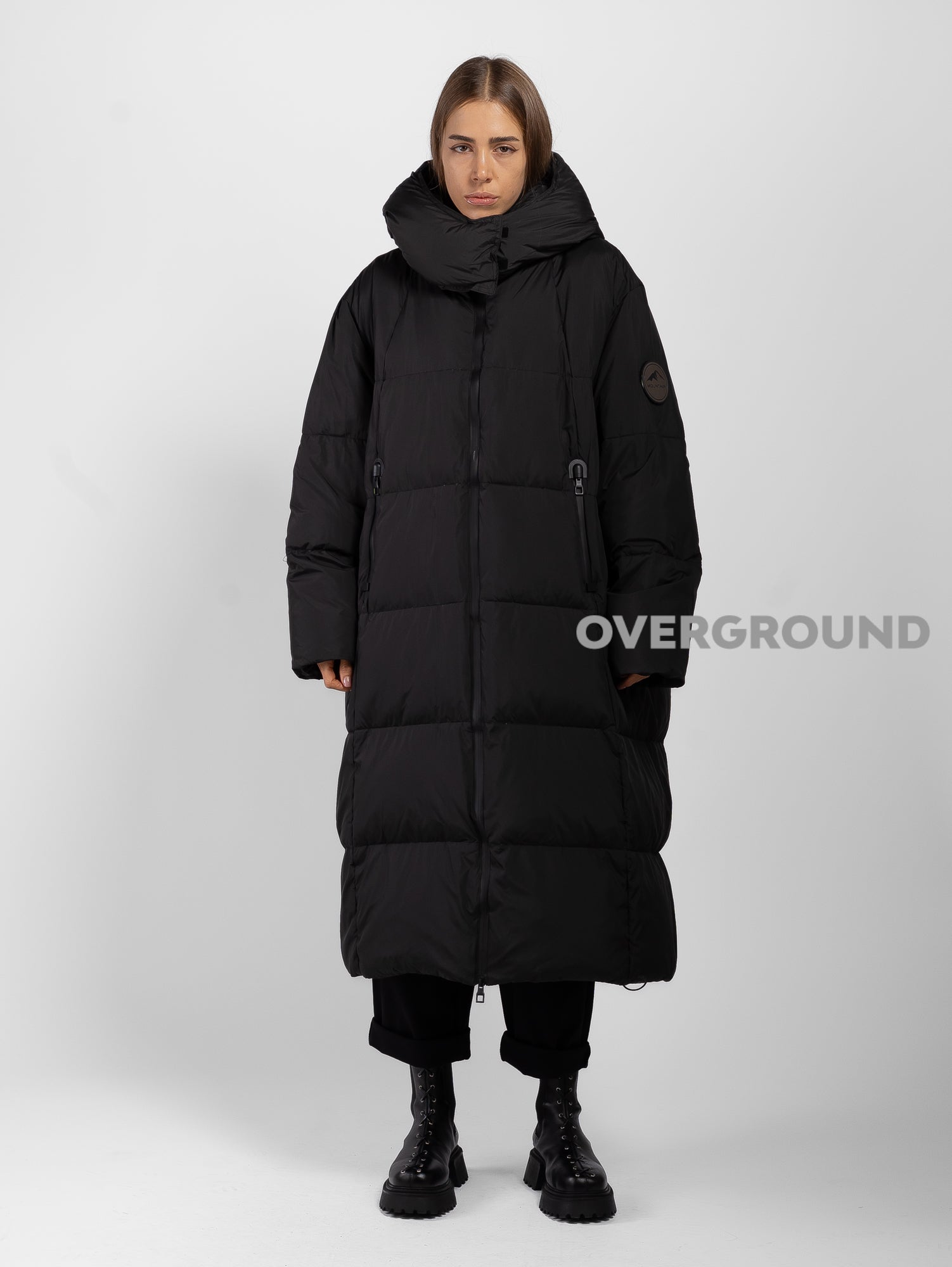 PIUMINO OVER CON TASCHE CON CERNIERA