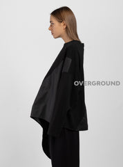 MAGLIA OVER ASIMMETRICA CON PUNTA