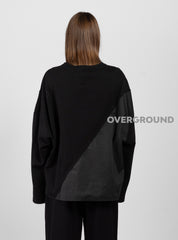 MAGLIA OVER ASIMMETRICA CON PUNTA