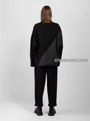 MAGLIA OVER ASIMMETRICA CON PUNTA