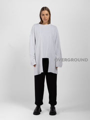 MAGLIA OVER ASIMMETRICA CON CUCITURE