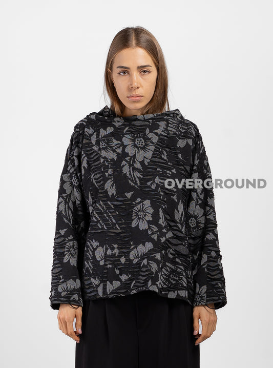 Blusa con collo a barca tessuto lavorato