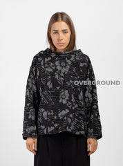 Blusa con collo a barca tessuto lavorato