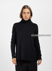 MAGLIONE LUNGO COLLO ALTO CON INTRECCIO