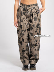 PANTALONE OVER FANTASIA CON PENS SUL GAMBULE