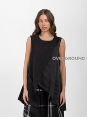 SMANICATO ASIMMETRICO GESSATO - OVERGROUND STORE 