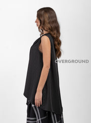 SMANICATO ASIMMETRICO GESSATO - OVERGROUND STORE 