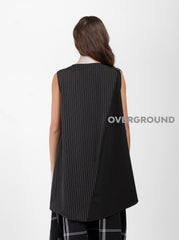 SMANICATO ASIMMETRICO GESSATO - OVERGROUND STORE 