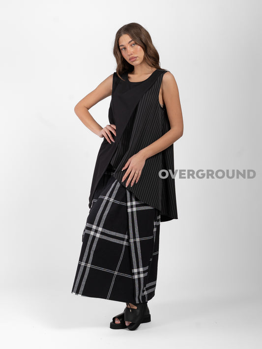 SMANICATO ASIMMETRICO GESSATO - OVERGROUND STORE 