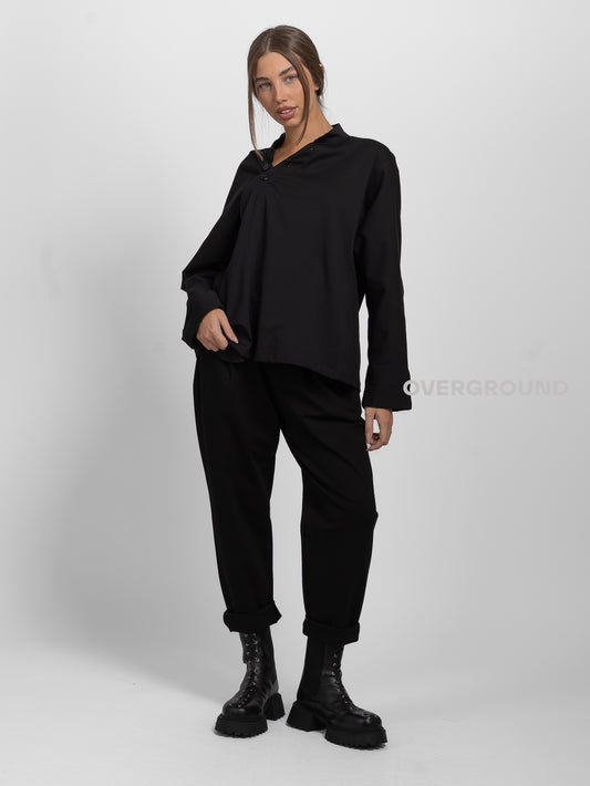 OVERSIZED TROUSERS WITH SIDE BUTTONS AT THE WAIST