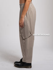 PANTALONE OVER CON TASCONI OBLIQUI