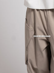 PANTALONE OVER CON TASCONI OBLIQUI