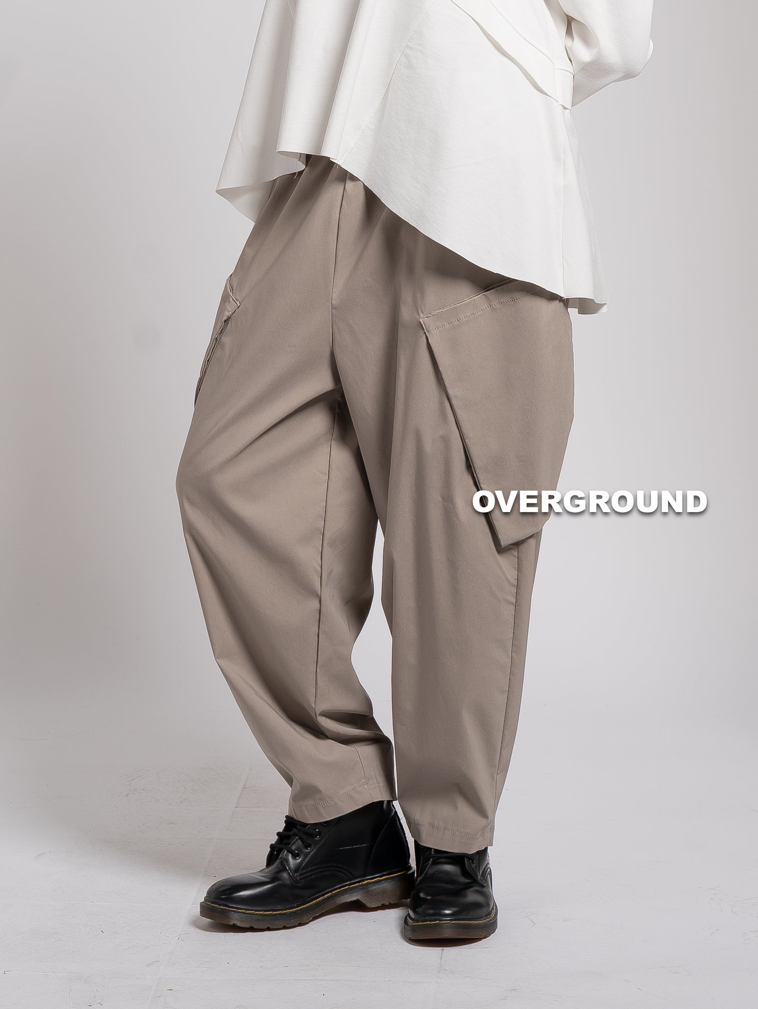 PANTALONE OVER CON TASCONI OBLIQUI