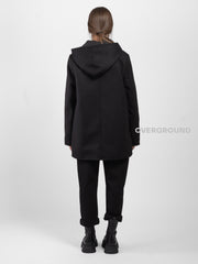 Asymmetrical jacket with hood and zip and Z buttons