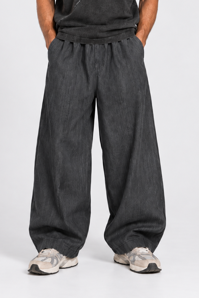PANTALONE OVER CON TASCHE DIETRO